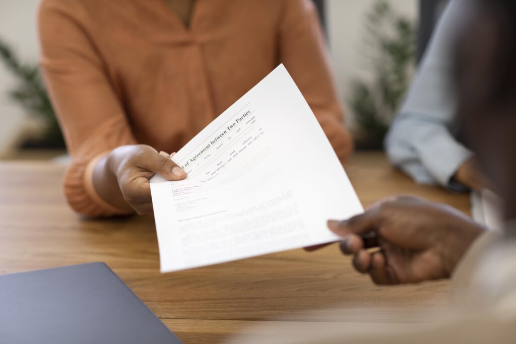 man holding contract his new office job after interview